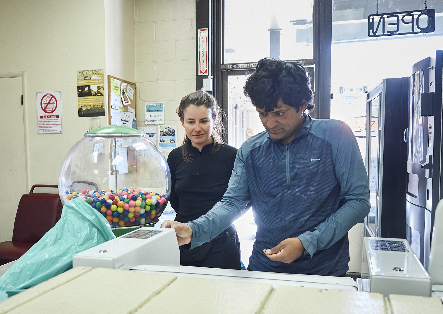 Hikers in a laundromat in Mammoth Lakes.