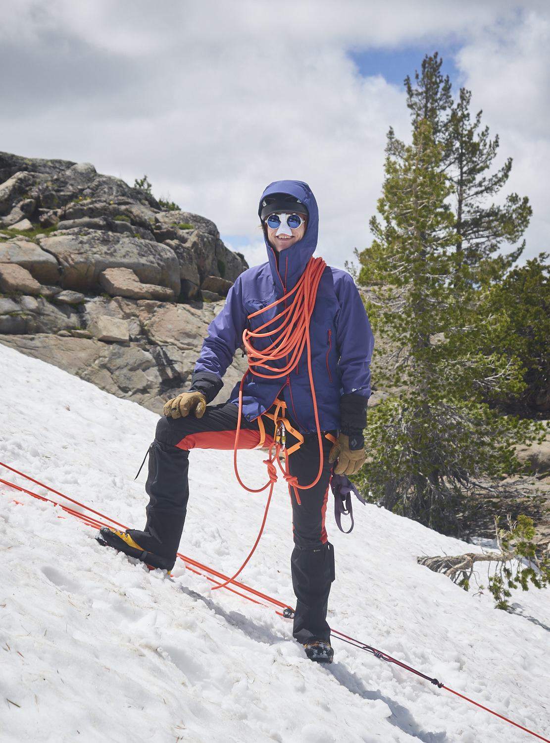 A man is exercising some mountaineering skills near highway 88.