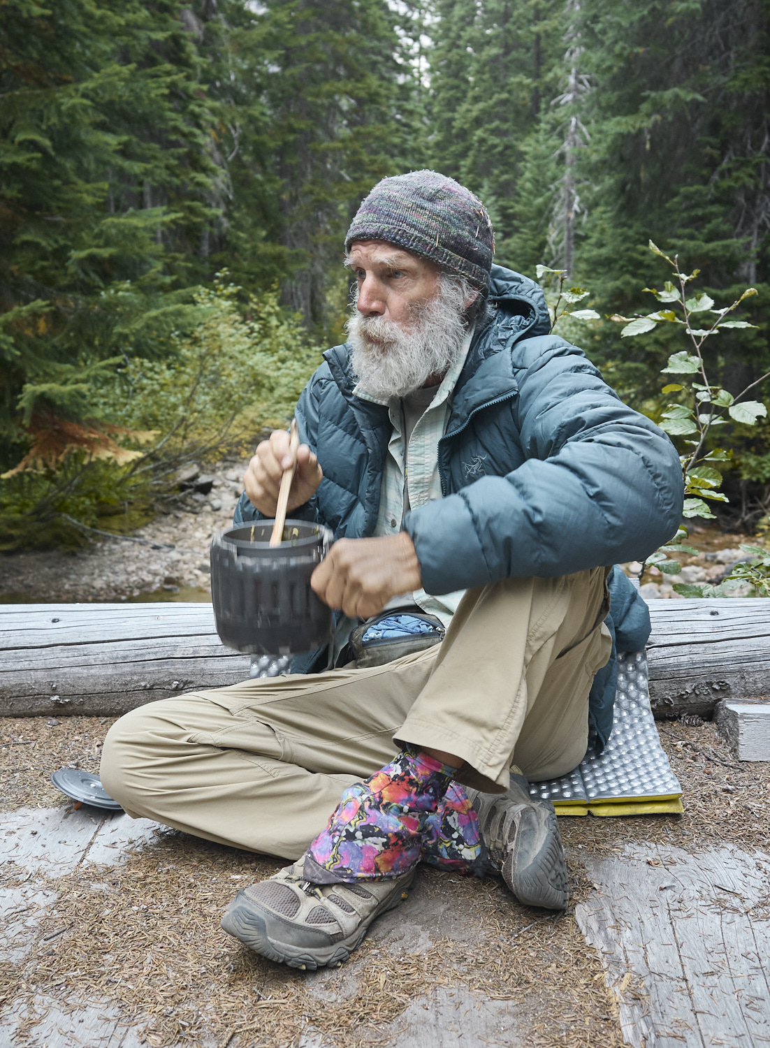 „Dog“ is sitting on a bridge during dinner in Northern Washington.