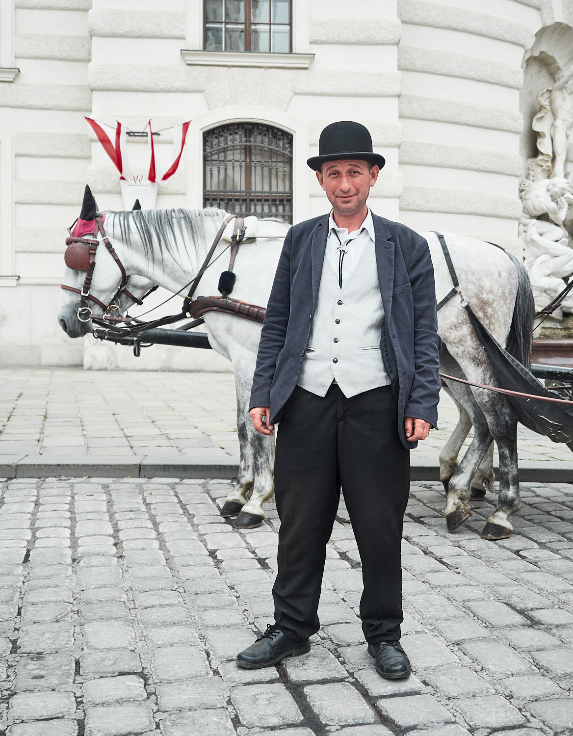 Ein Fiakerfahrer am Michaelerplatz.